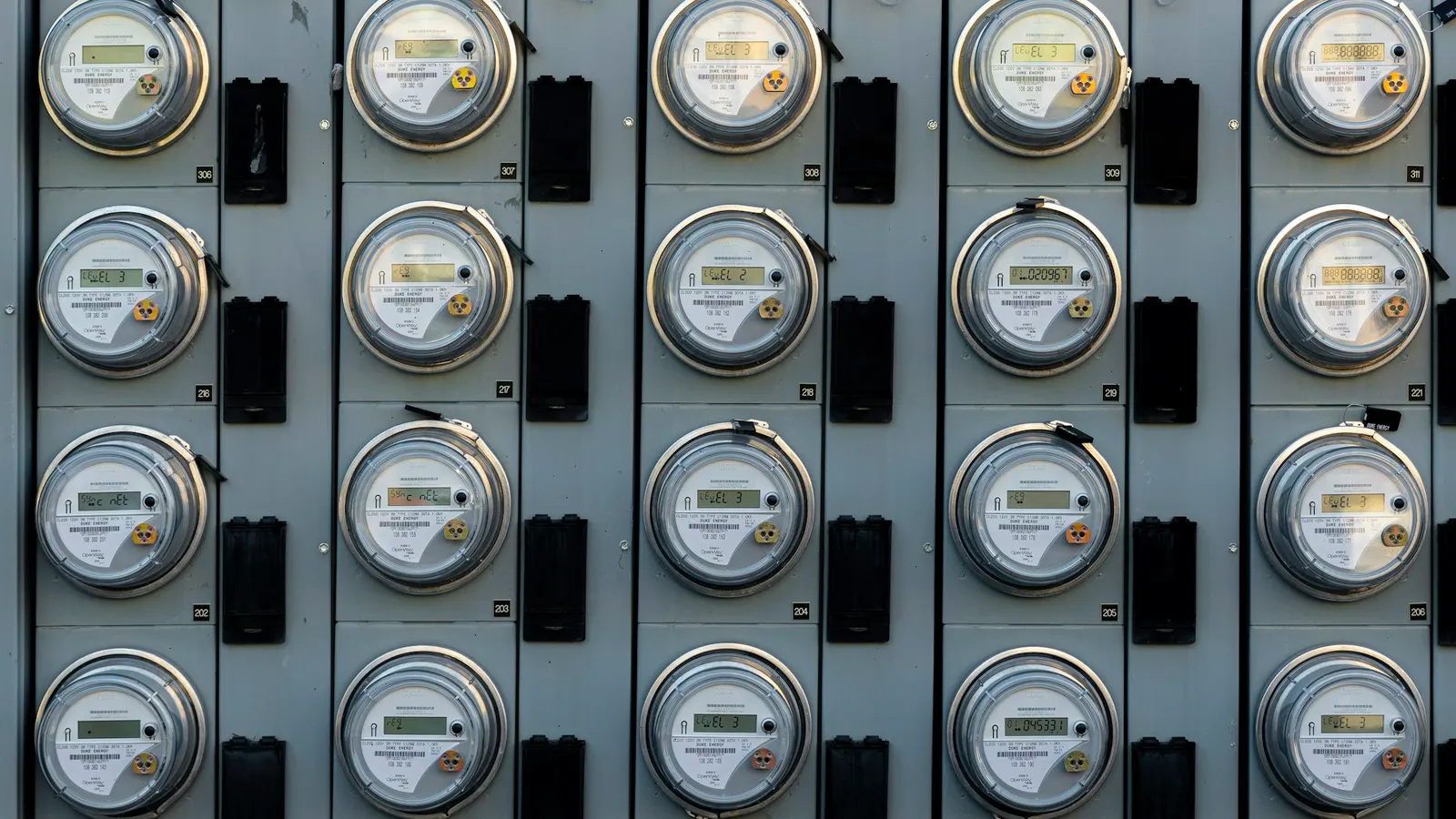Rows of electricity meters on a wall